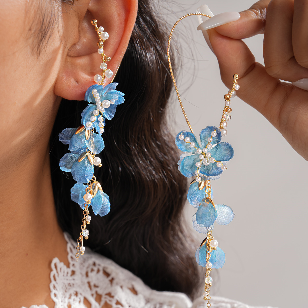 Europa y los Estados Unidos super inmortal vidrio de perla chiffon flor de bordillo personalidad dulce aretes de aretes de vacaciones de mar aretes de viento