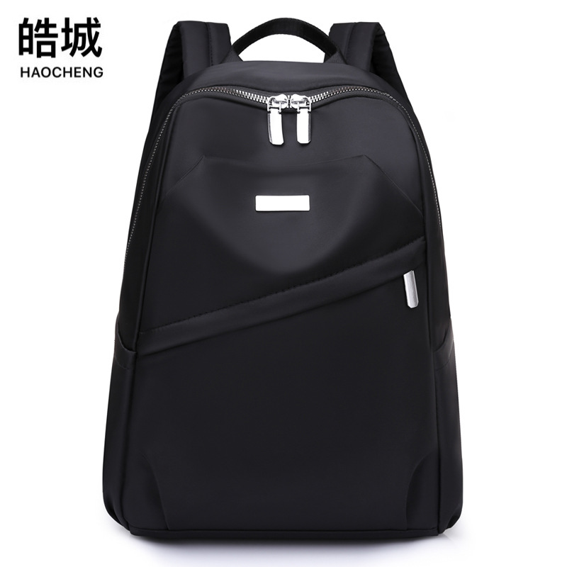 2023 primavera nuevo estilo coreano Oxford mochila femenina moda portátil estudiante de secundaria mochila de viaje mochila de computadora