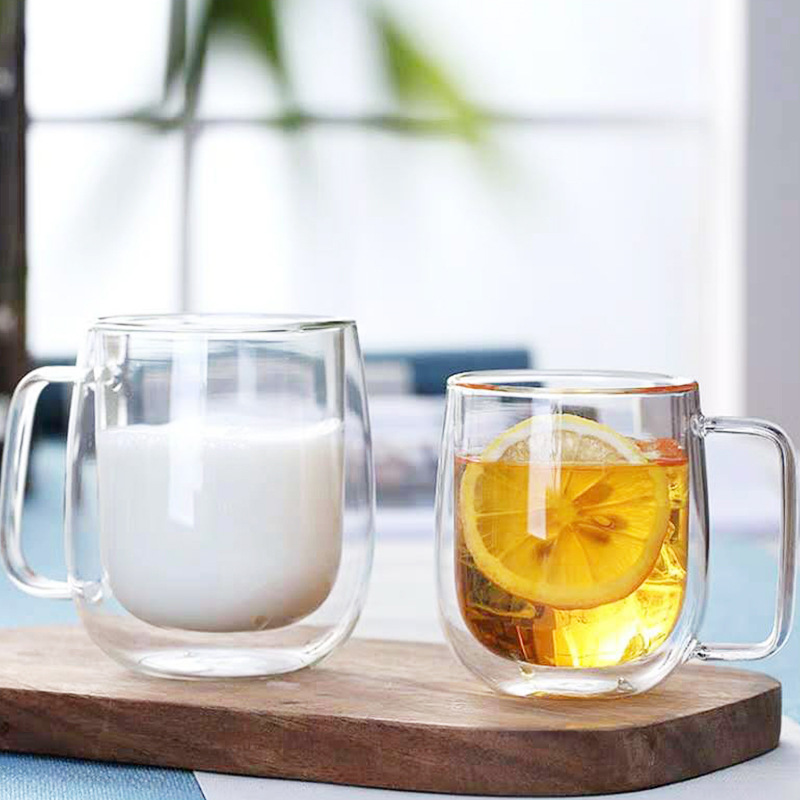Fabricantes de alta transparencia de vidrio de borosilicato en stock para el hogar taza de té taza de jugo de leche taza de vidrio de doble capa aislante