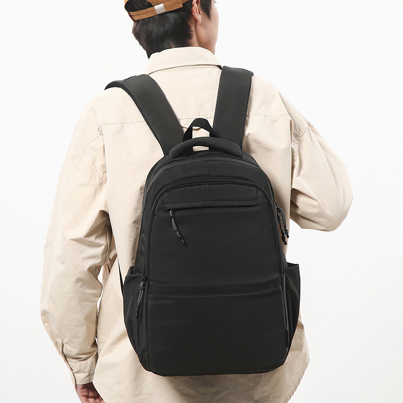 新款大容量初高中生书包简约通勤电脑包外贸双肩包男韩版跨境批发