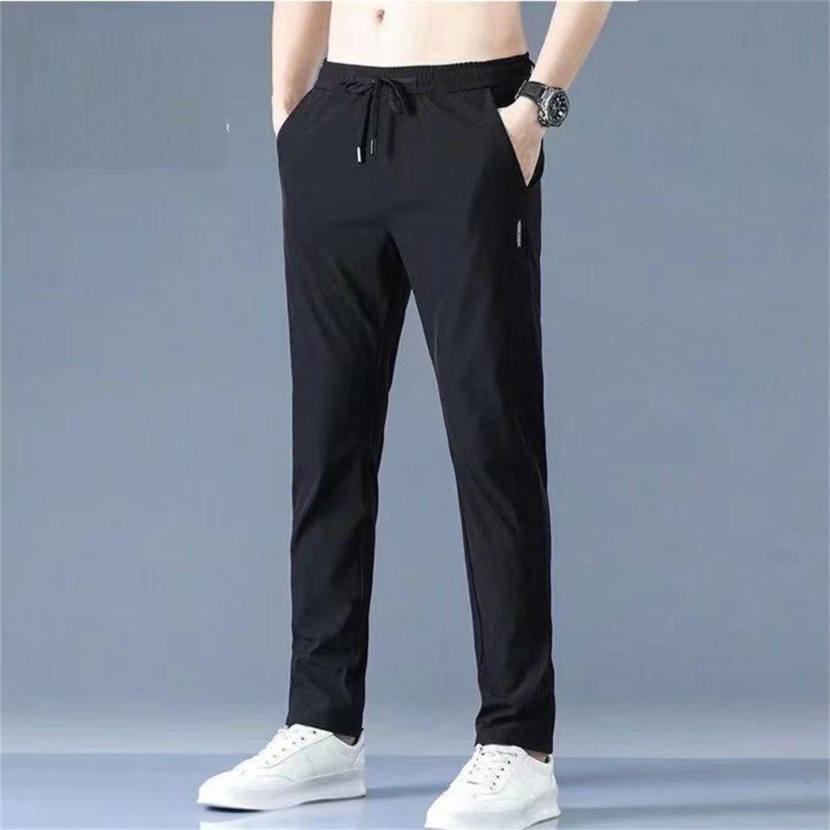 Pantalones casuales de los hombres rectos slim fit verano fino elástico cinturón elástico pantalones sueltos más tamaño entrega de una sola pieza
