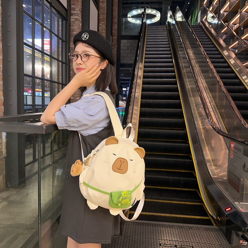 Mochila japonesa encantadora de dibujos animados 2024 nueva extraña mochila de muñeca de gran capacidad de muñeca de estudiantes