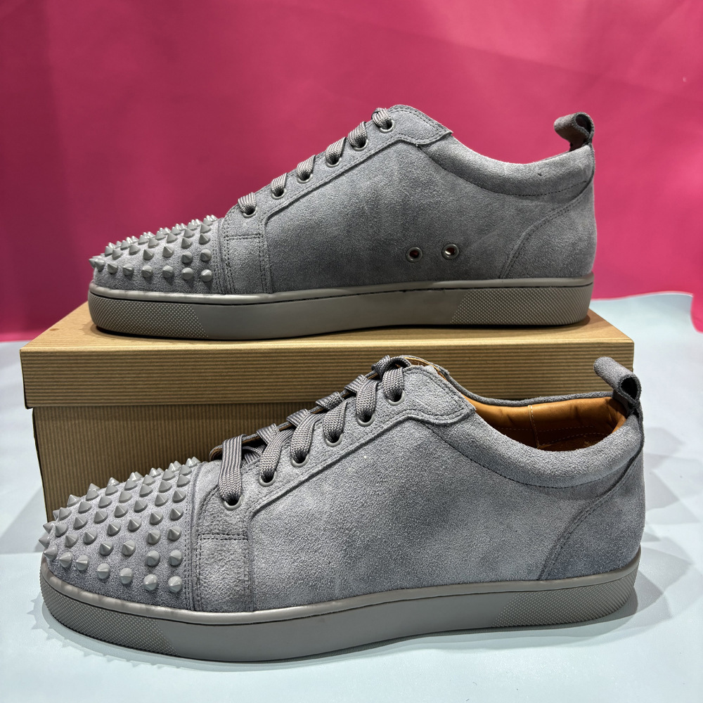 Europa y los Estados Unidos comercio exterior zapatos rojos remachos zapatos de hombre tacos de pareja zapatos casuales de moda zapatos casuales zapatos casuales