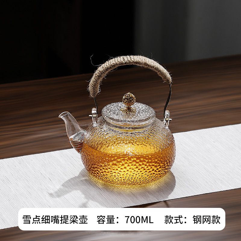 Venta directa de fábrica Tetera de vidrio con alto contenido de borosilicato Tetera de espuma con patrón de martillo de viga de elevación de metal Tetera de vidrio de alta calidad para el hogar