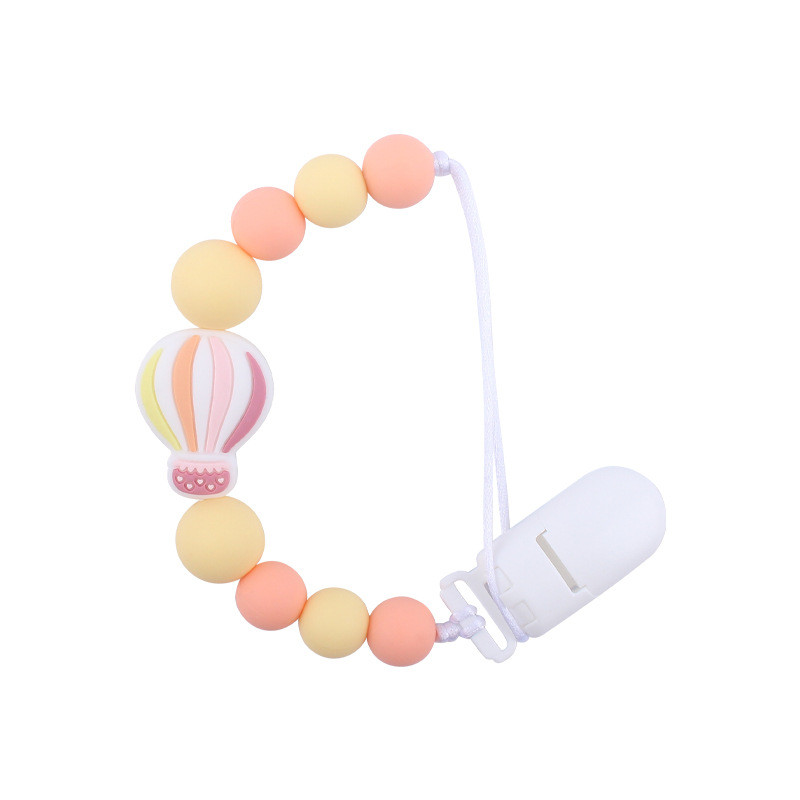 Nuevo bebé suministros chupete cadena creativa dibujos animados globo de aire caliente de silicona mordedura cadena anti-gota molar