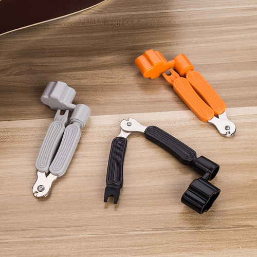 Guitar string cutter folk guitar stringer three-in-one string cutter string winder nail remover guitar string changing tool
