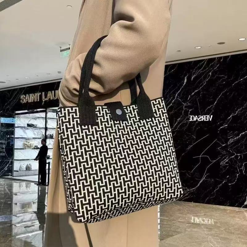 Japón y Corea del Sur tejido bolsas de mano bolsas de viaje de gran capacidad bolsas de compras de chicas fabricantes de bolsas H al por mayor
