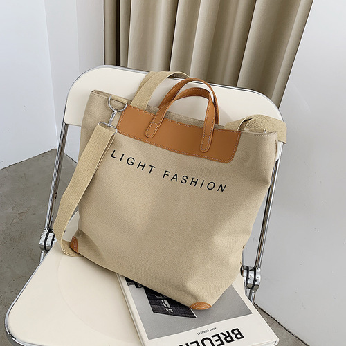 Canvas bag new style women's bag large capacity Korean style fashion shoulder crossbody bag handheld tote bag bag delivery