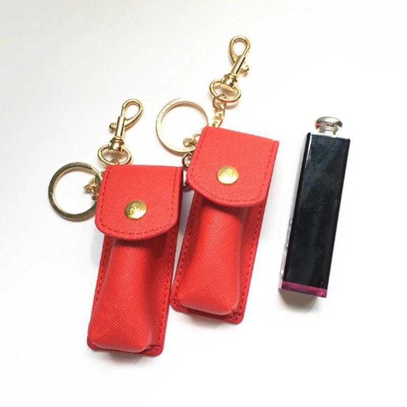 En stock lápiz labial caja de cuero lápiz labial portátil brillo de labios protección pequeña caja de cuero creativo llavero transfronterizo