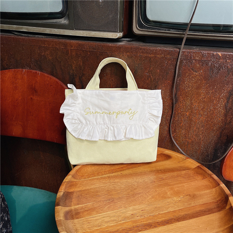 1441 Japanese and Korean chic Sweet ruffled bento Bag, Fresh embroidered hand-held small cloth bag, girl student bag wholesale undefined