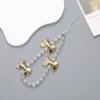 K2208--3 butterfly mobile phone chain golden color