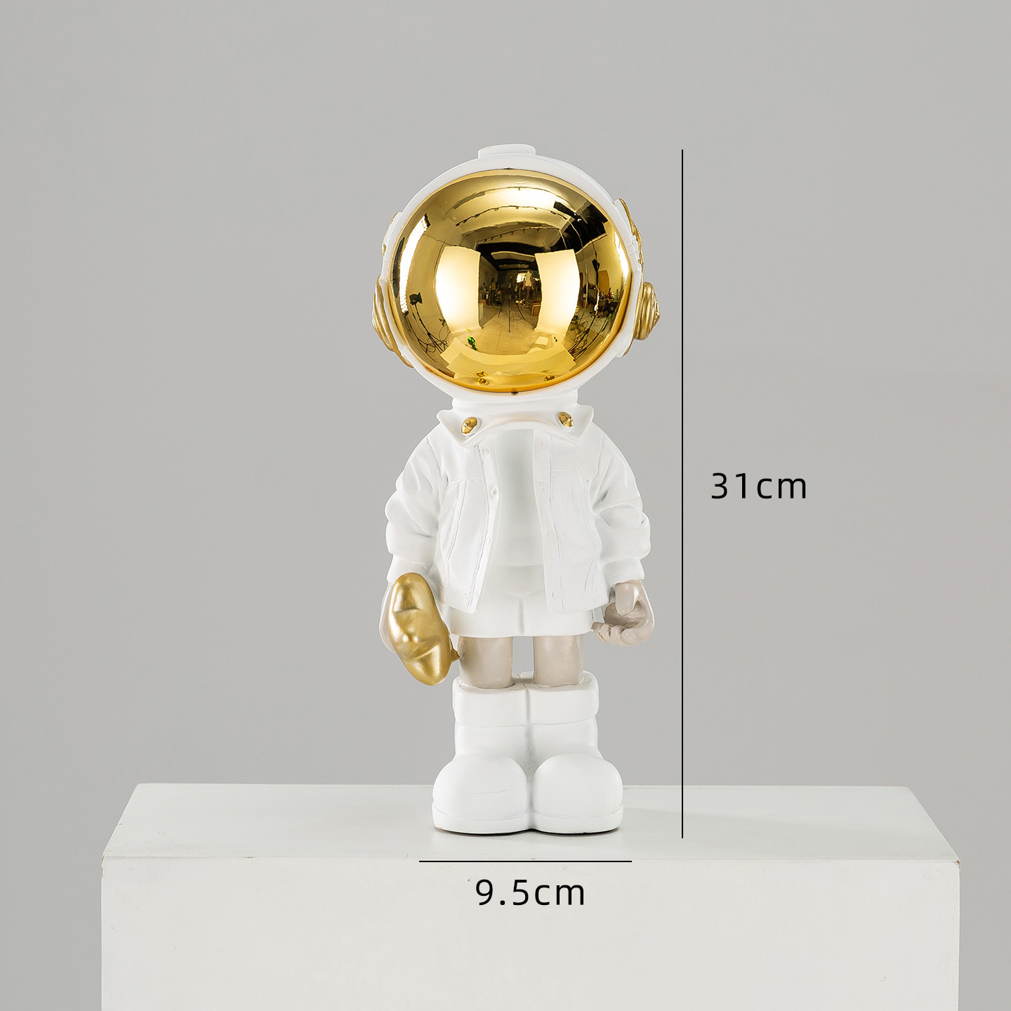 Astronauta blanco galvanizado en oro