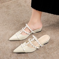 599-10 Korean version shallow mouth hollowed out wedge heel women's shoes white rivet fashion half drag pointed toe middle heel wearing slippers for women