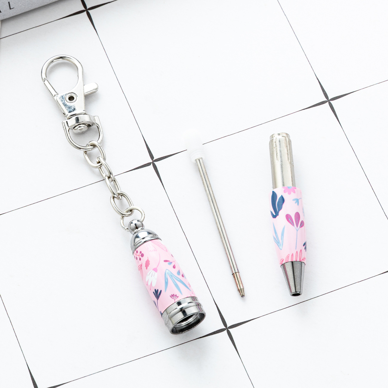 Keychain creativo mini bolígrafo de oficina estudiantes portátiles bolígrafo de bolsillo corto mini bolígrafo de metal