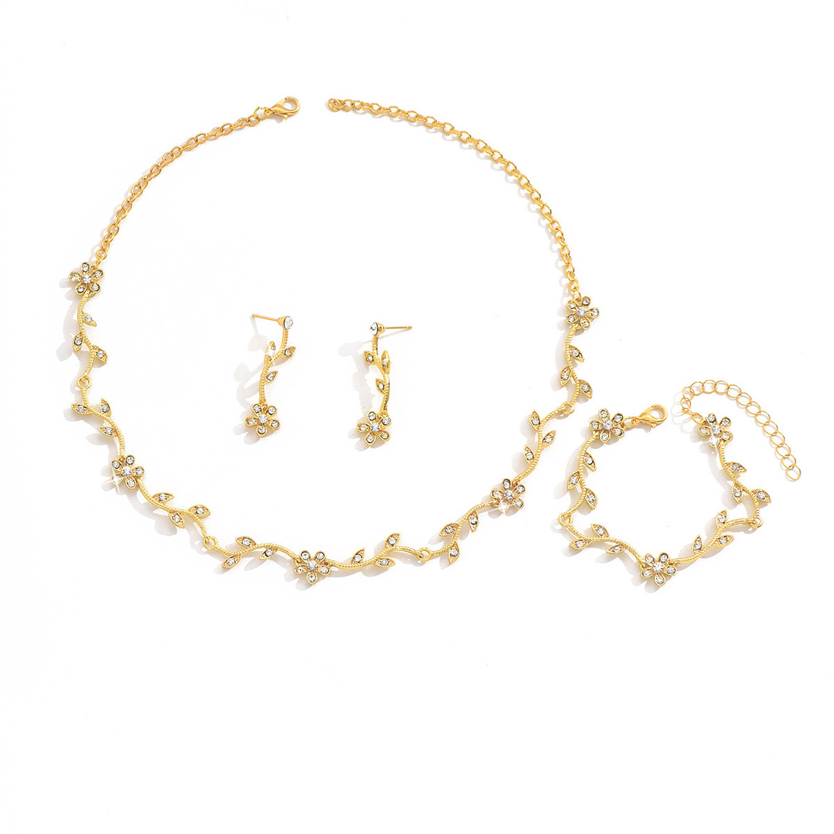 2024 invierno moda coreana moda de lujo ligero con incrustaciones de diamantes hojas en forma de flor collar pendientes pulsera de tres piezas al por mayor