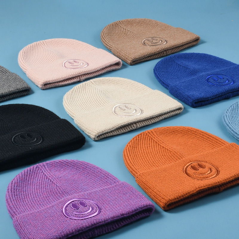 秋冬新款卡通帽子男时尚纯色毛线帽女休闲笑脸针织帽冷帽现货批发