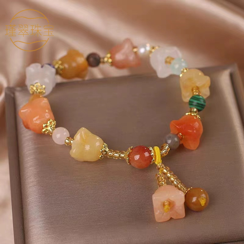 Pulsera de seda dorada con cuentas de lirio de los valles, pulsera de estilo étnico para mujer, pulsera de amistad de lujo ligero, joyería para transmisión en vivo.