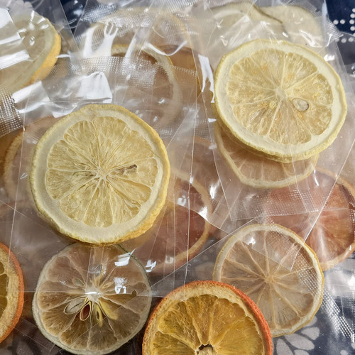 Wholesale Orange Slices/Orange Chips, Dried Orange in Individual Small Bags—Factory Direct, Bulk Orders Welcome with Special Discounts on Lemons Slices in Small Bags