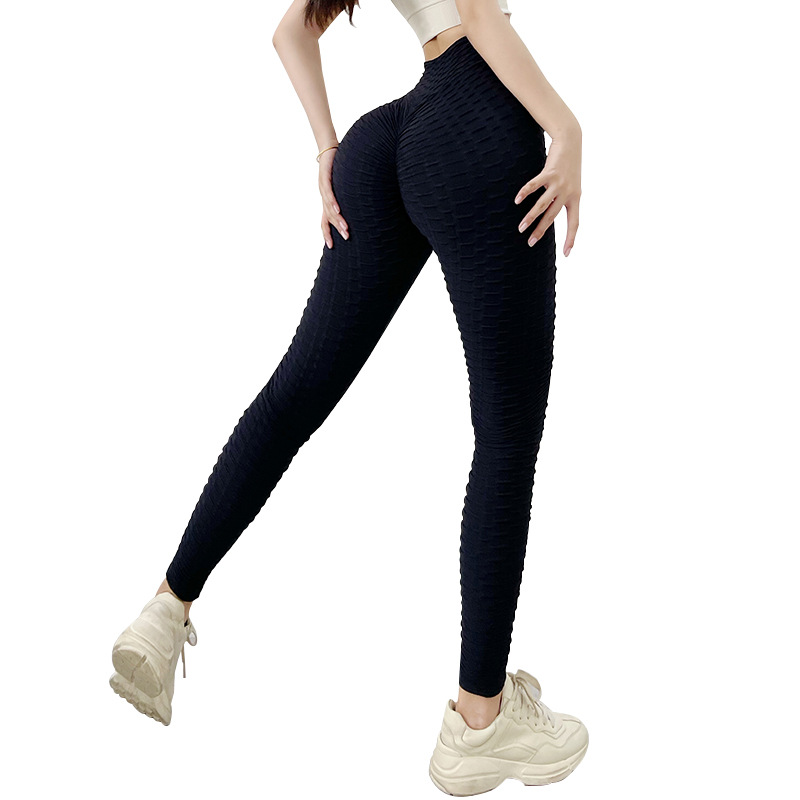 Pantalones de yoga jacquard sin costuras estilo europeo y americano, pantalones deportivos de secado rápido que realzan los glúteos, pantalones para realzar el trasero.