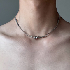 ヒップホップの冷たい風は趣味の蛇の骨のチェーンの短い金のチタンの鋼の男性のネックレスの女性の鎖の鎖を結びません。
