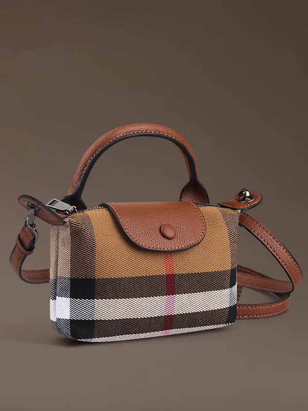 Bolsos pequeños de venta caliente de comercio exterior para mujer 2025 nuevo bolso bandolera salvaje textura celebridad de Internet estilo caliente bolso de teléfono móvil de alta gama