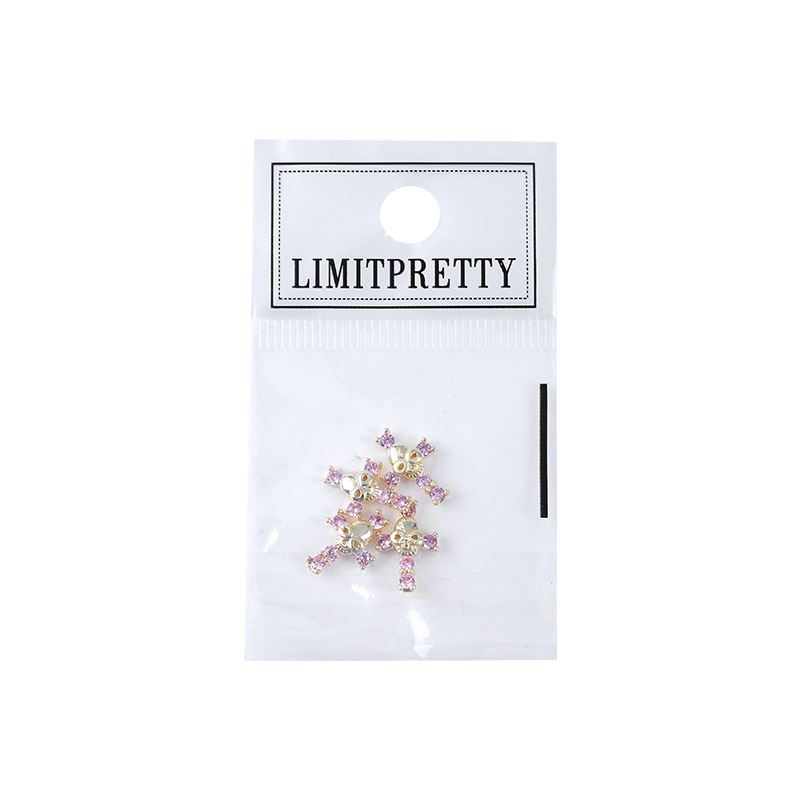 Red Cruz Roja marco joyería de uñas vintage punk metal personalidad aleación diamante incrustado cráneo decoración de uñas