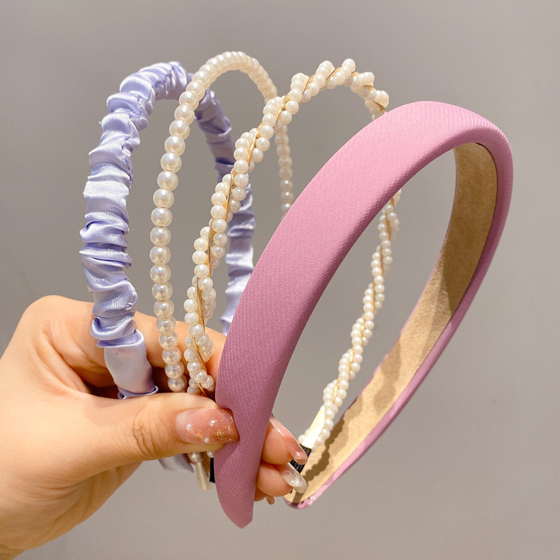 A principios de la primavera, la banda de cabello para mujeres en línea, 2025 nuevo lavado de cara de presión de tarjeta de cabello para el cabello, banda de cabello de perlas, banda de cabello para mujeres.