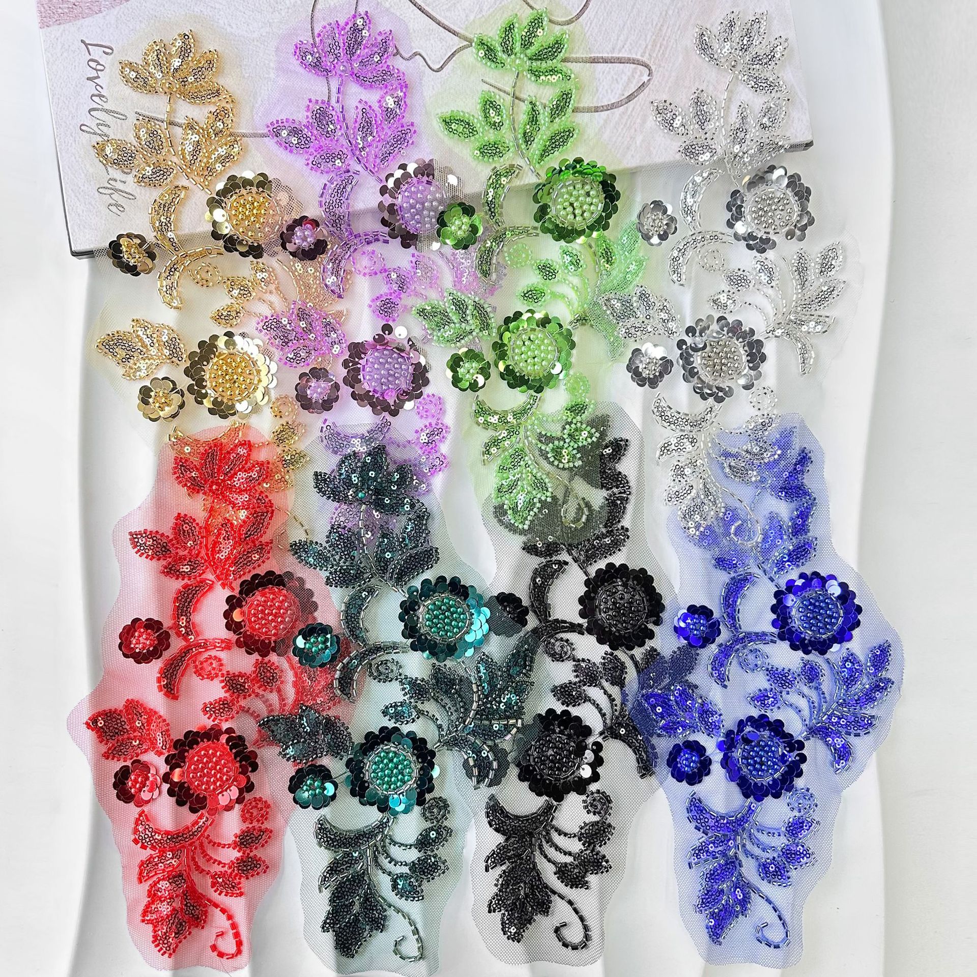 Sequinilla cuentas bordadas decal spot ropa al por mayor vestido de malla multicolor encaje vestido de rendimiento flores encaje