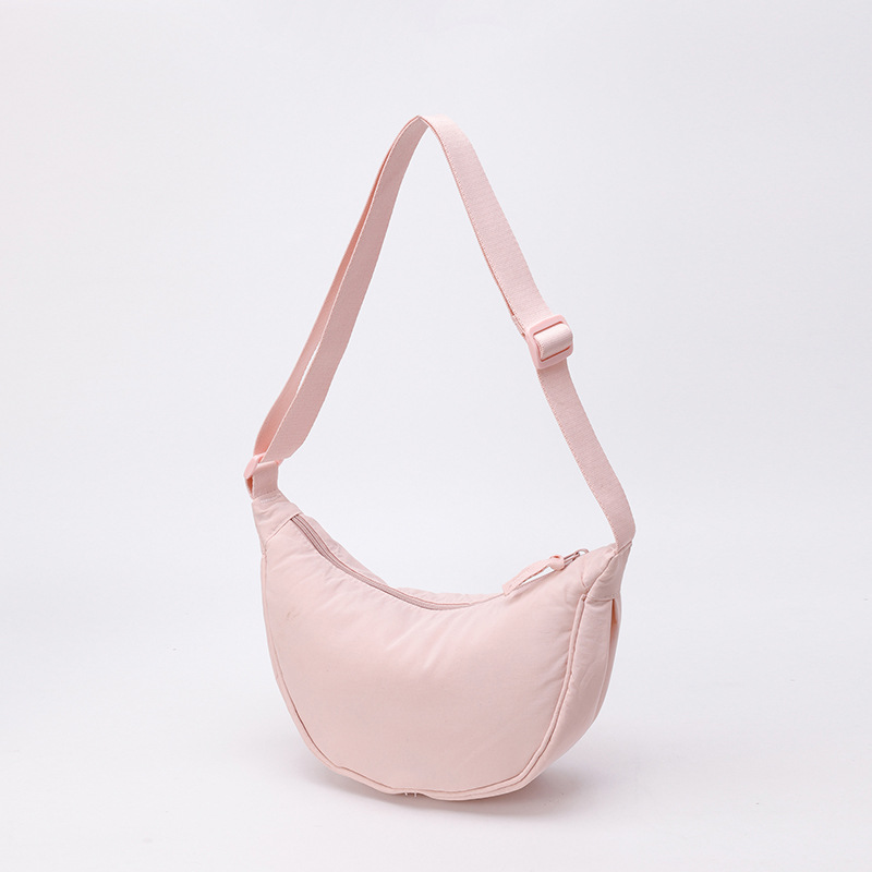 Bolso de tela pequeño bolso de moda ligero bolso de mochila de nylon transfronterizo mujer bolso de hombro casual versátil bolso de bolsas de bolsas de bollo de gran capacidad