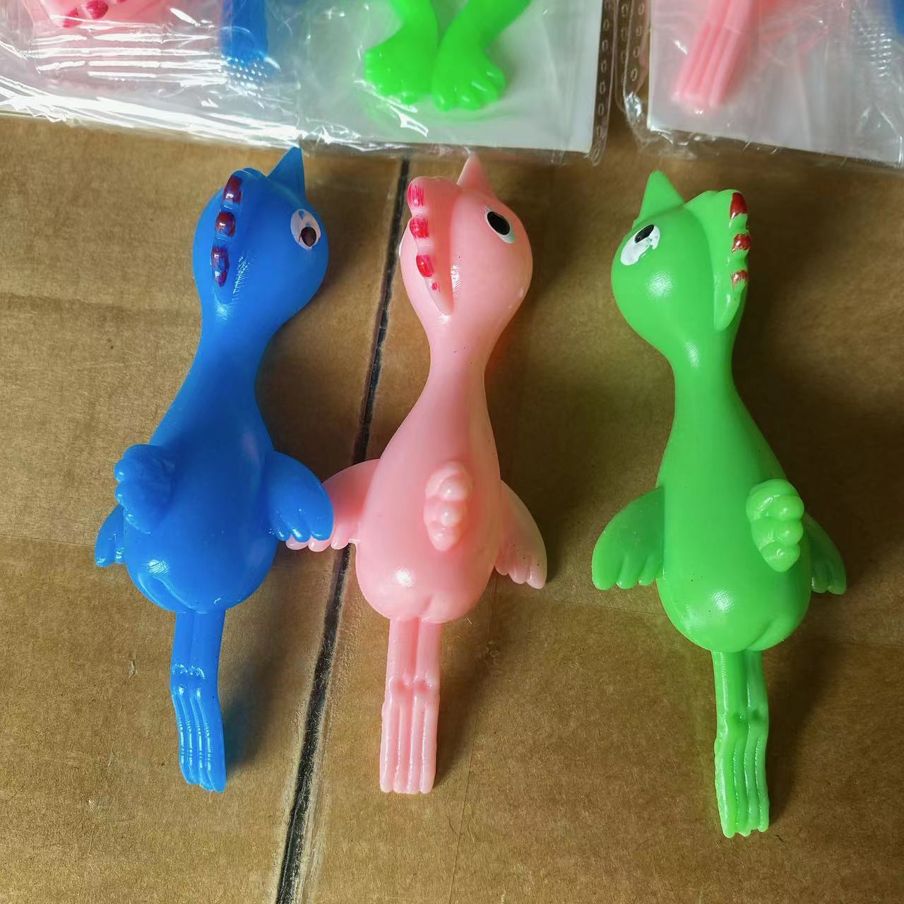Catapulta de pollo de lanzamiento de pollo 2 yuanes tienda por departamento puesto al por mayor juguetes niños diversión elasticidad