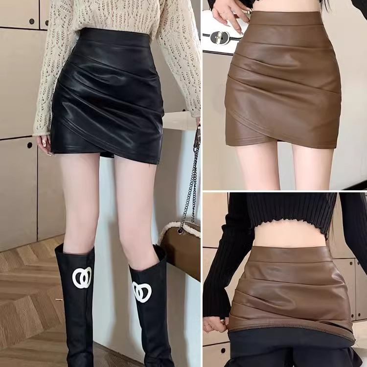 Small leather skirt skirt women's spring autumn and winter 2025 new high waist A- line black irregular hip skirt