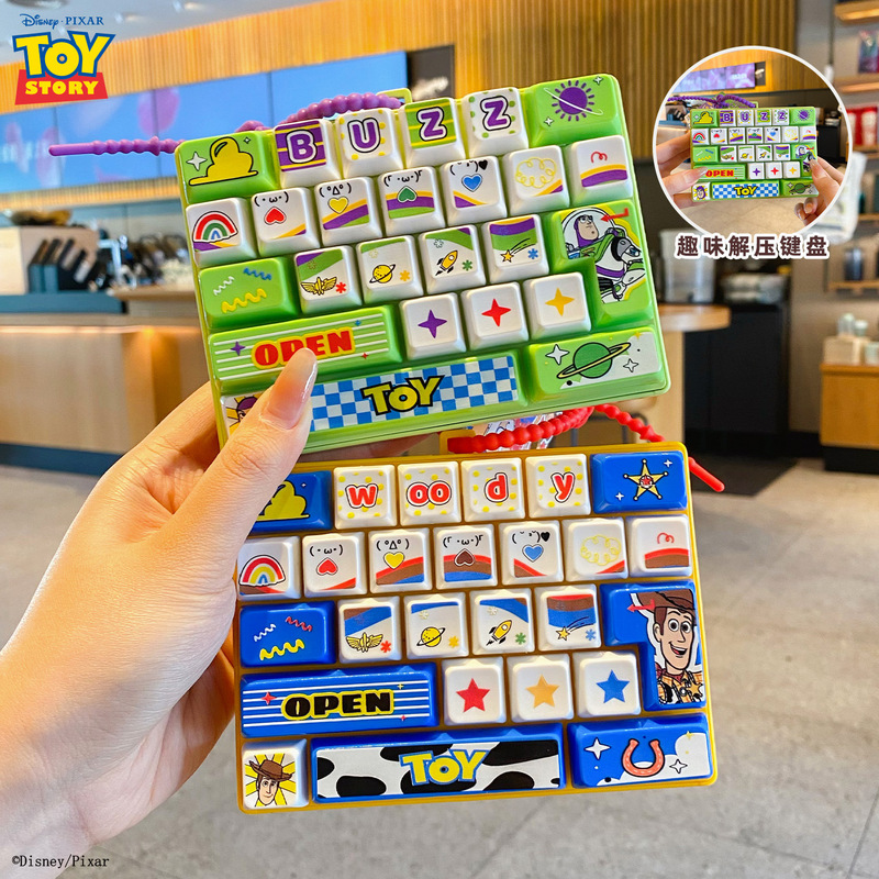 Authentic Toy Story 26-Key Keyboard with Pressable Keys, Portable Creative Stress-Relief Fingertip Toy, Student Pendant