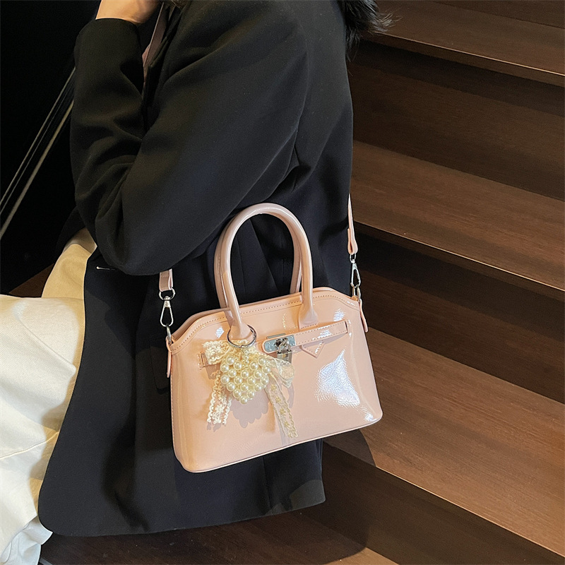 Bolso de concha de moda de verano transfronterizo para mujer 2025 nuevo bolso de hombro de estilo occidental de todo fósforo bolso de mensajero de moda de alta gama