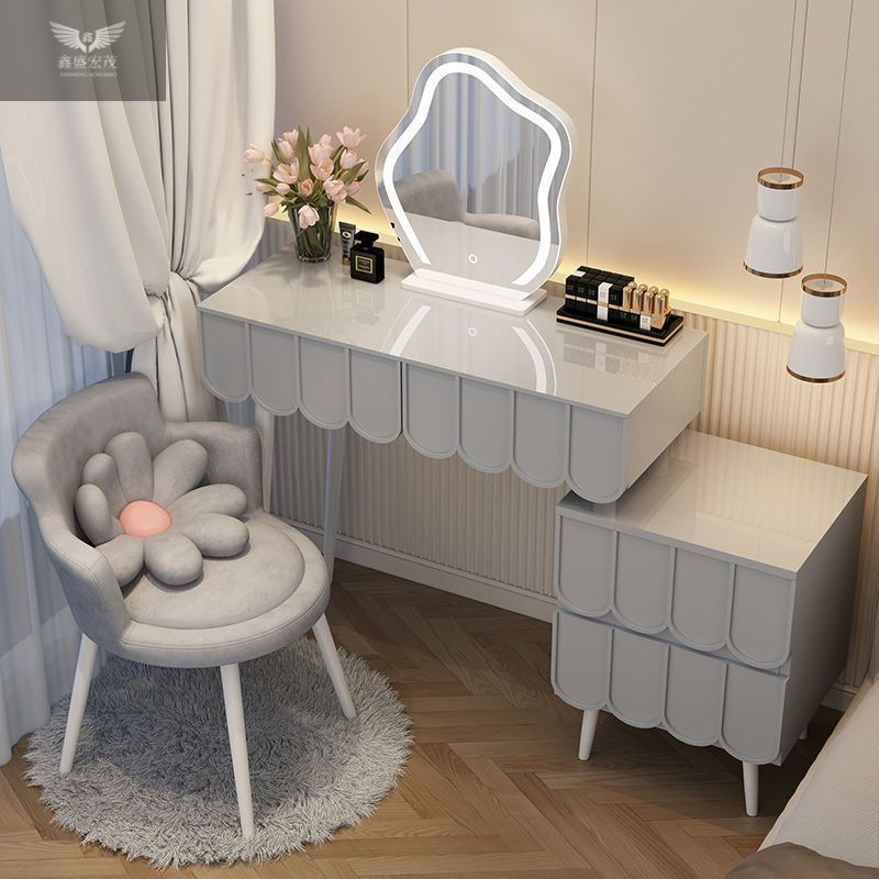 Luz y lujo moderno y simple mesas de maquillaje retráctiles estilo francés crema de estilo dormitorio armario de madera maciza en uno