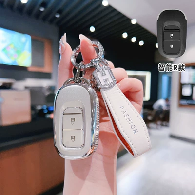 the Key Cover on the Picture: Car key bag - bt-key-r-type-smart-2-button-side-diamond-white-single-shell-h-rope-diamond-buckle