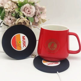 手机支架;钥匙扣及钥匙扣配件;餐垫、杯垫