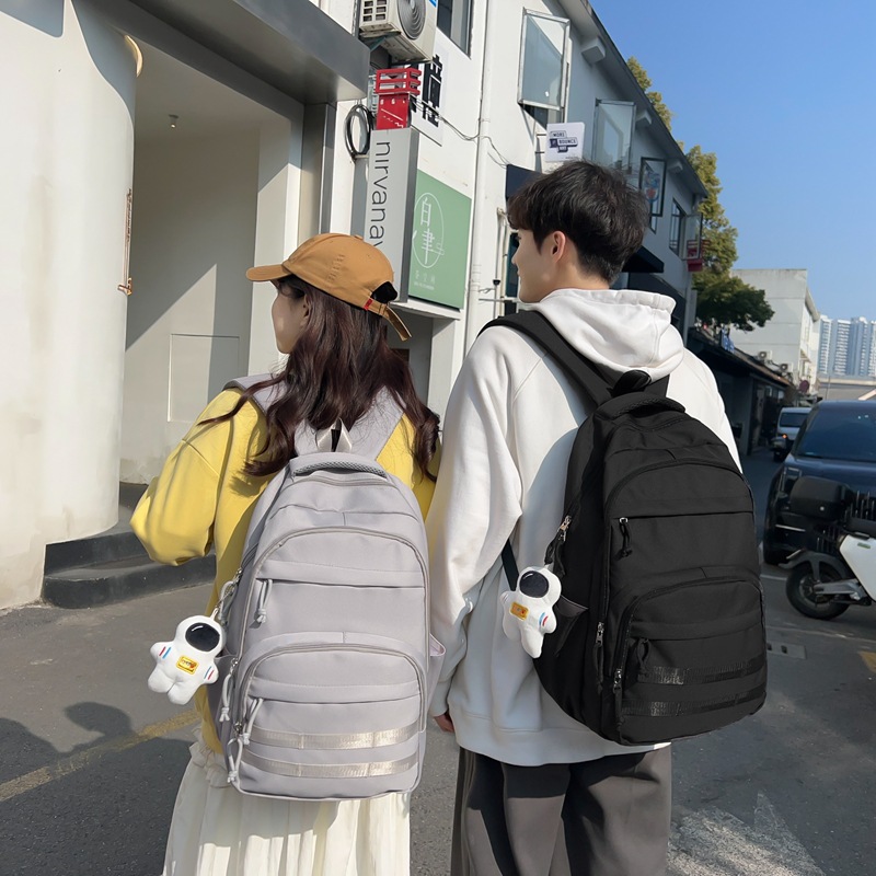 Nueva mochila estilo Coreano simple hombre y mujer estudiante mochila de gran capacidad mochila de la computadora de viaje de ocio