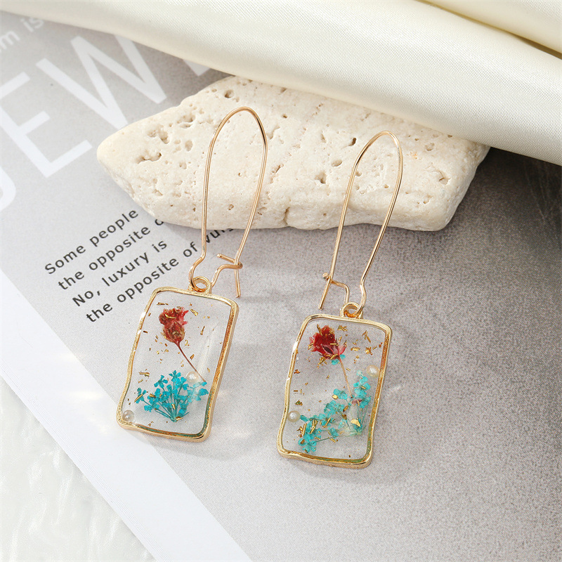 Synthetic Resin, Alloy Material 1 Pair Simple Style Dried Flower Epoxy Transparent Synthetic Resin Alloy Dangling Earrings
