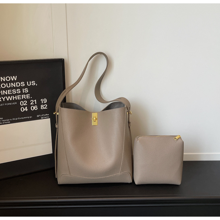 Bolso de mujer nicho sensación de alto nivel litchi estampado bolso de balde 2026 nuevo estilo de alta capacidad de moda bolso de hombro