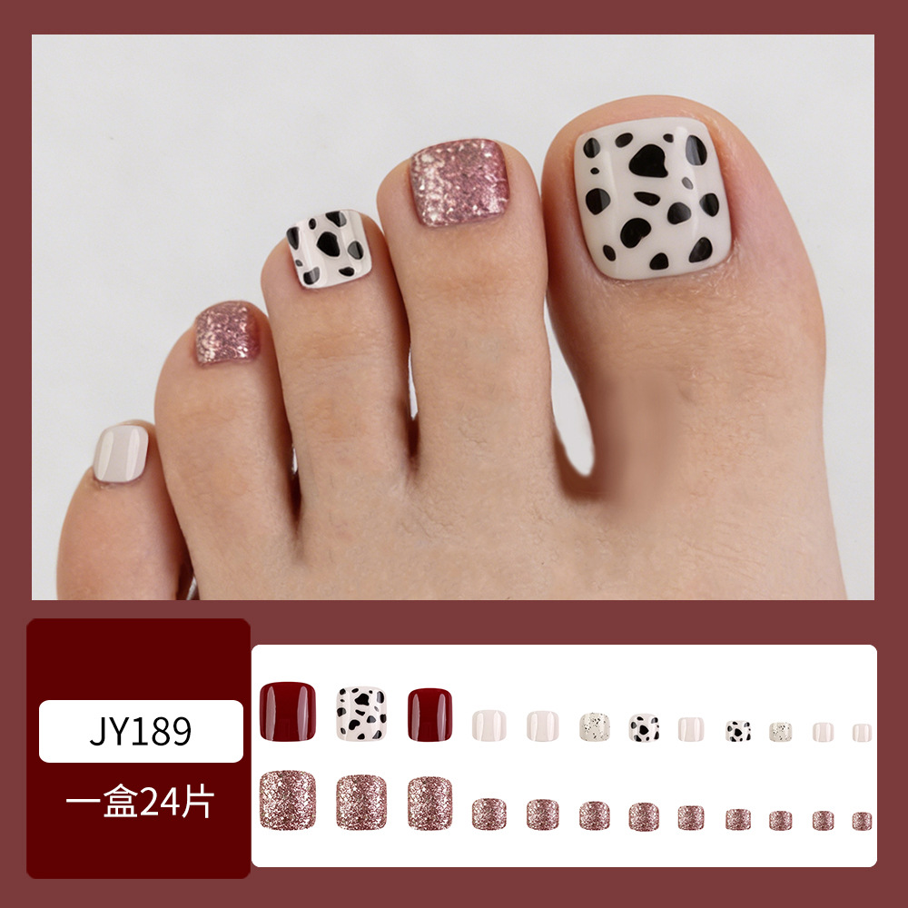 Comercio exterior dulce y fresco estampado de vaca polvo brillante de manicuras retro transfronterizas pie de viento usar uñas 24 piezas de parche de uñas de los dedos de los pies