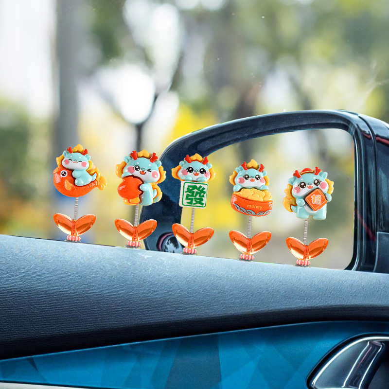 2024 modelos de año nuevo sacudiendo la cabeza adornos de coche bebé dragón adornos de coche lindo suministros de coche muebles de consola central