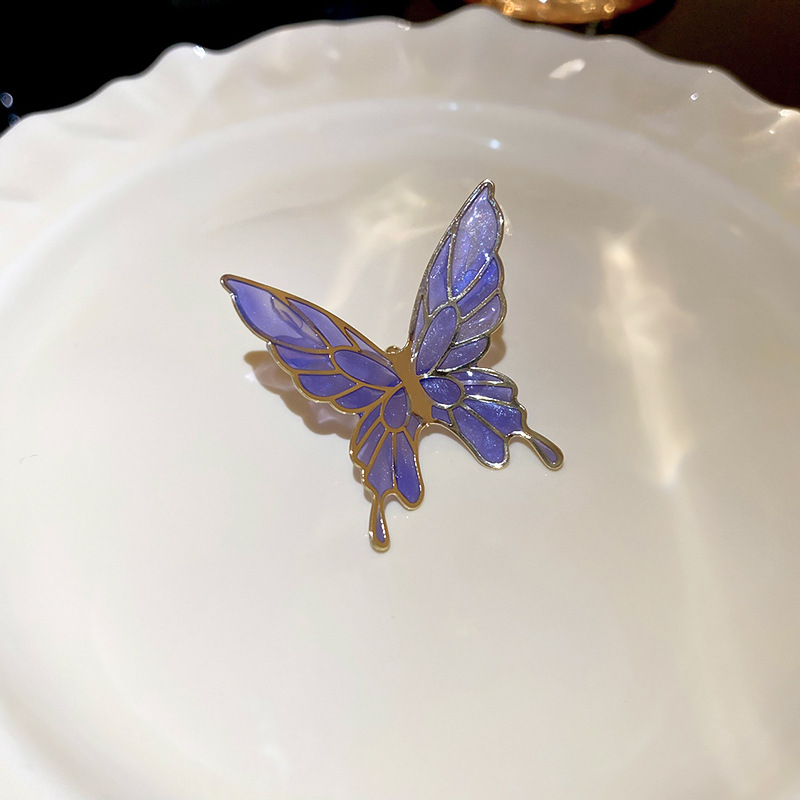 Pinzas para las orejas de aceite de goteo de mariposa súper hada sin orejas pinzas para las orejas de temperamento dulce y de moda, pendientes de personalidad fresca y de todo fósforo al por mayor