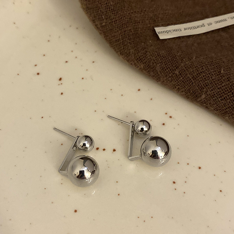 Aguja de plata Zircon en forma de U plisada pendientes curvados personalizada estilo frío serie de plata pendientes simples nichos pendientes de temperamento