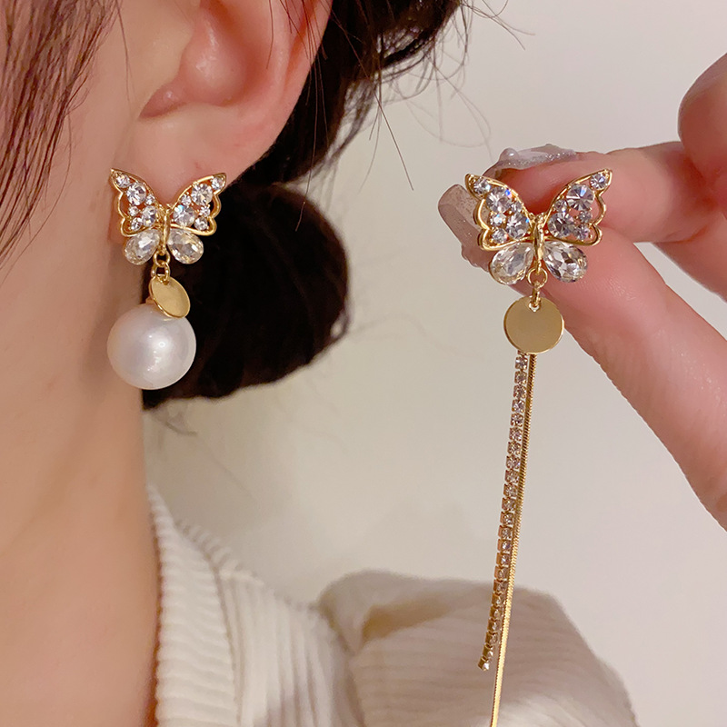 Estilo coreano Luz de lujo Dongdaemun asimétrico circón mariposa perla borla pendientes exquisitos pendientes de moda de alta calidad para las mujeres
