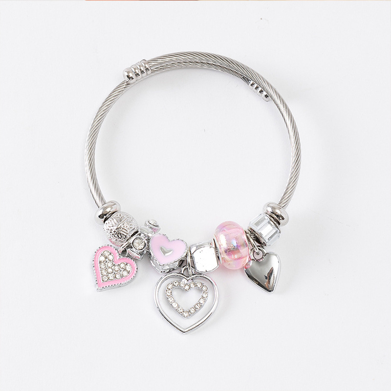 Panjia pulsera Dora DIY cuentas explosivas transfronterizas color rosa goteo amor colgante cuentas de cristal pulsera de acero en forma de corazón