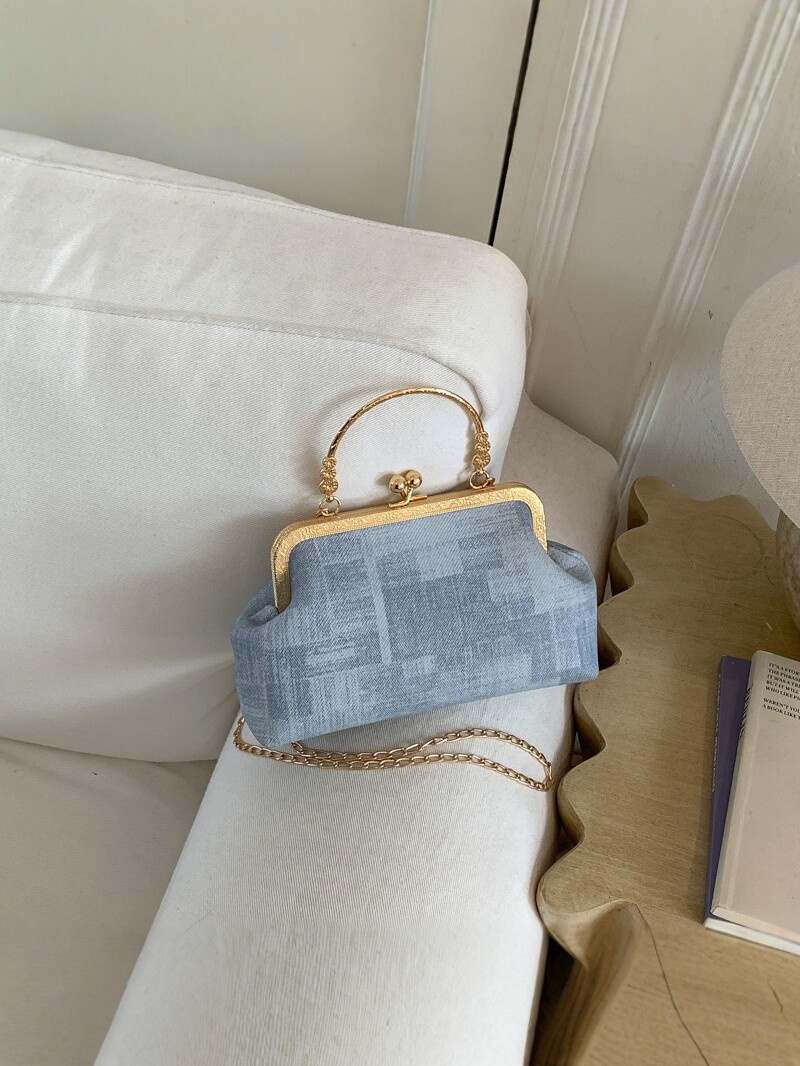2026 nuevo pequeño viento de cadena bolsa de cena de mujeres de alto nivel sensación abrazadera bolso de mano mochila de estilo de moda bolsa de conchas