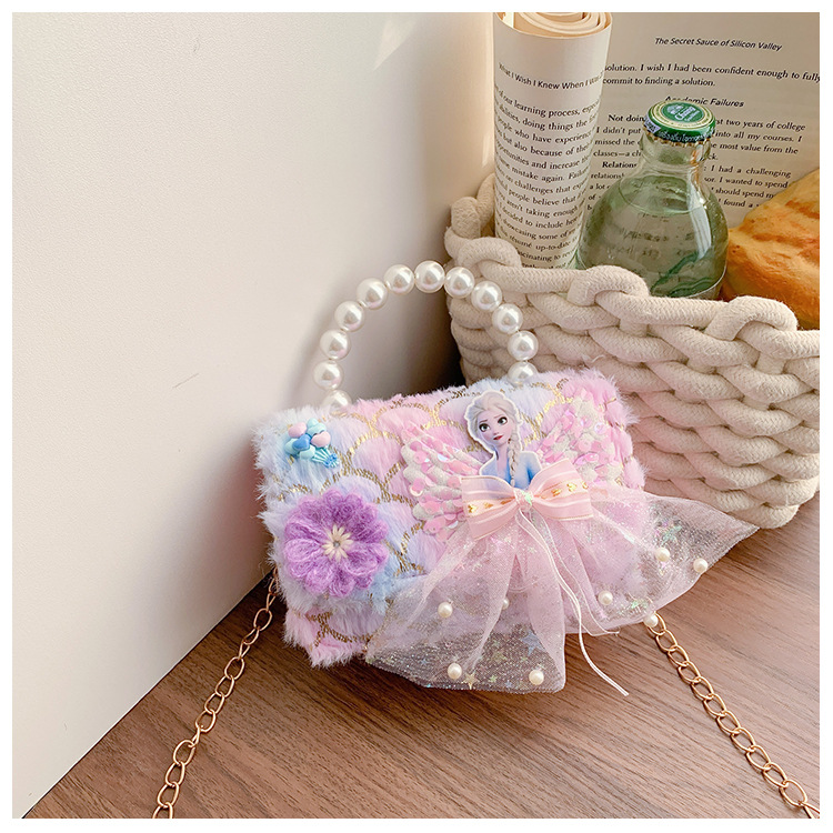 Bolsas de niños transfronterizas otoño y invierno nuevos lindos bolsos de peluche de perlas mini princesa bolsos de cadena de colores