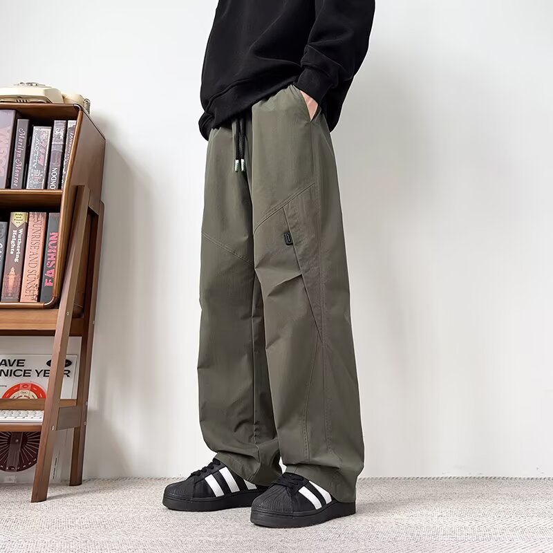 Hombres sueltos de tamaño grande comercio exterior primavera y otoño nuevos pantalones casuales de tamaño grande pantalones juveniles recto pantalones de piernas anchas transfronterizos