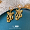 Earrings pearl with bow