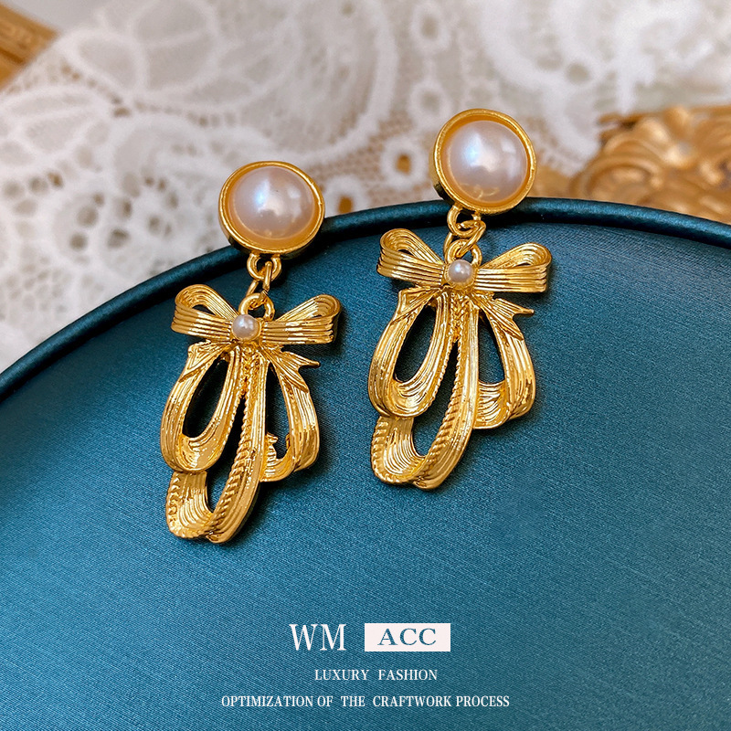 Earrings pearl with bow